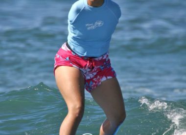 Jessica Cox surfing